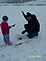 Isabella and her Grandpa Bob ice fishing. Taken January 2010 Bergfeld Pond by Diane Harris.