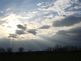 Sun Rays shining down through the clouds. Taken 4-15-10 Backyard by Peggy Driscoll.