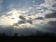 Sun Rays shining down through the clouds. Taken 4-15-10 Backyard by Peggy Driscoll.